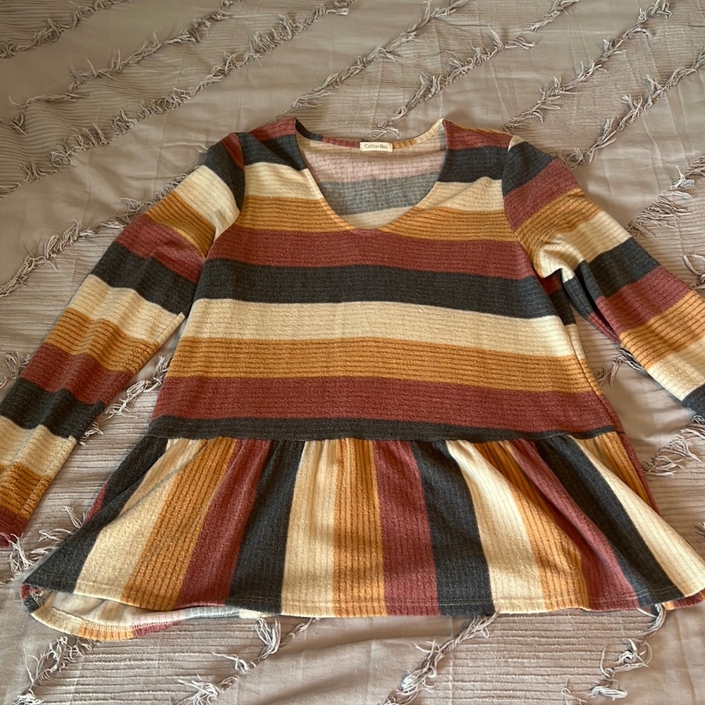 Striped, V neck sweater.